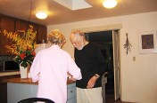 Byron & Mary in the Kitchen. Always Beautiful Flowers